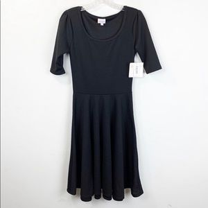 Lularoe solid black Nicole dress. New with tags.